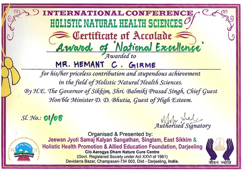 Mr. and Mrs. Hemant Girme with Acharya Balkrishna